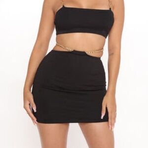 Boohoo “back it up” mini skirt in black, size L